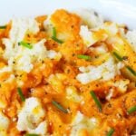 Thanksgiving pumpkin mashed potatoes with savory pumpkin, olive oil, chives, and cracked black pepper